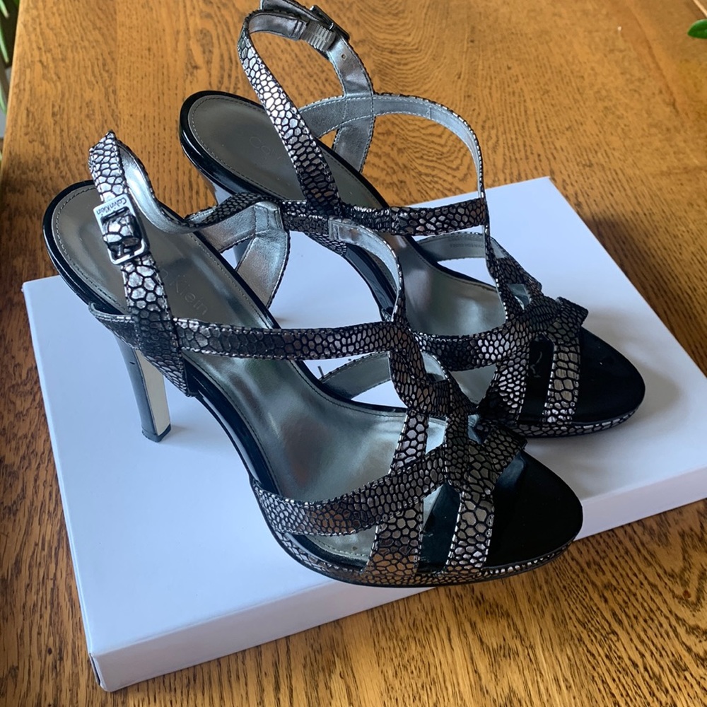 Calvin Klein heeled sandals. Size 8.  Lightly loved condition.